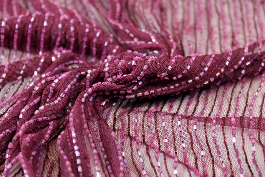 Purple tulle with purple embroidery and bugle bead stripes