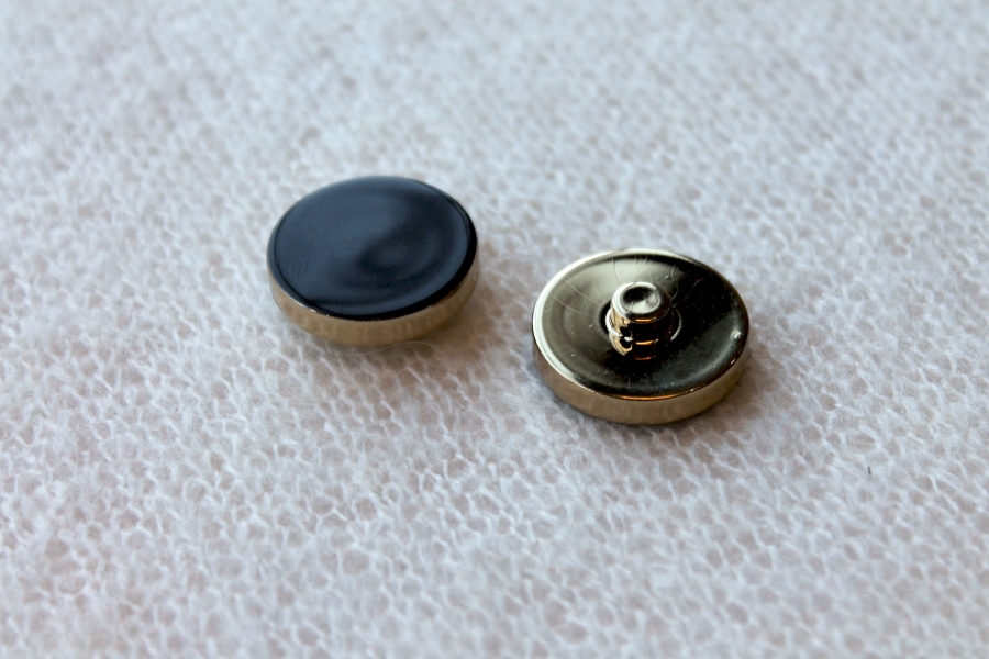 Gold Plastic Button with Black Resin Inlay