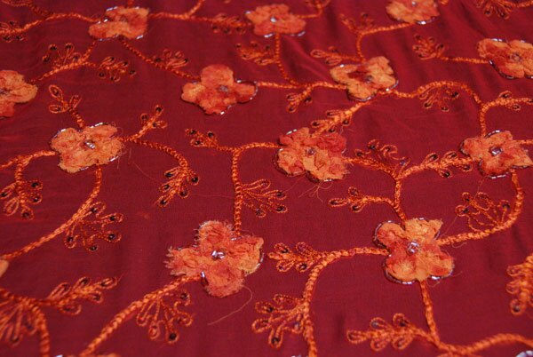Red chiffon with orange floral embroidery