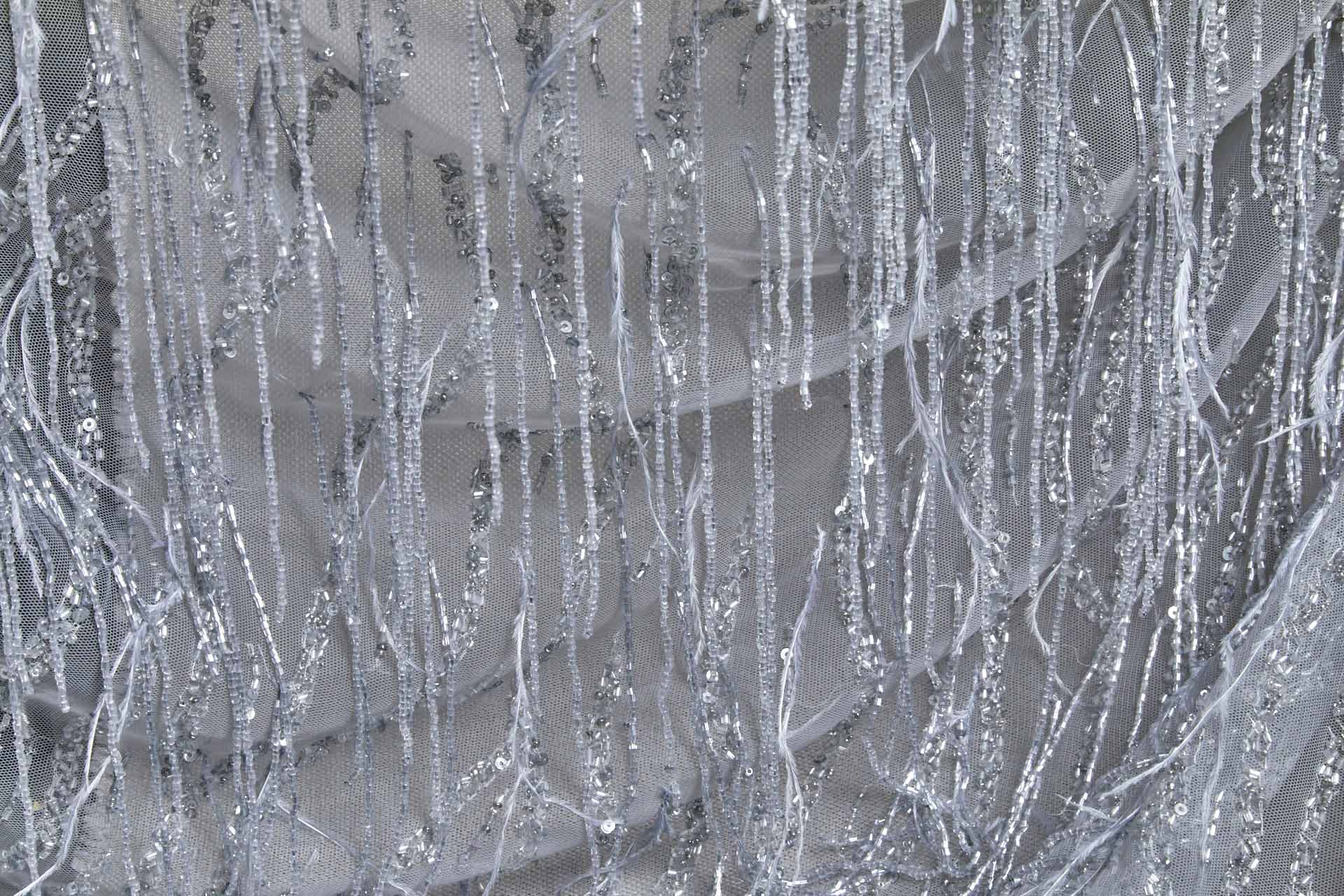 Beaded and Sequinned Nylon Tulle with Tassle Strings of Beads - Pale Grey fabric