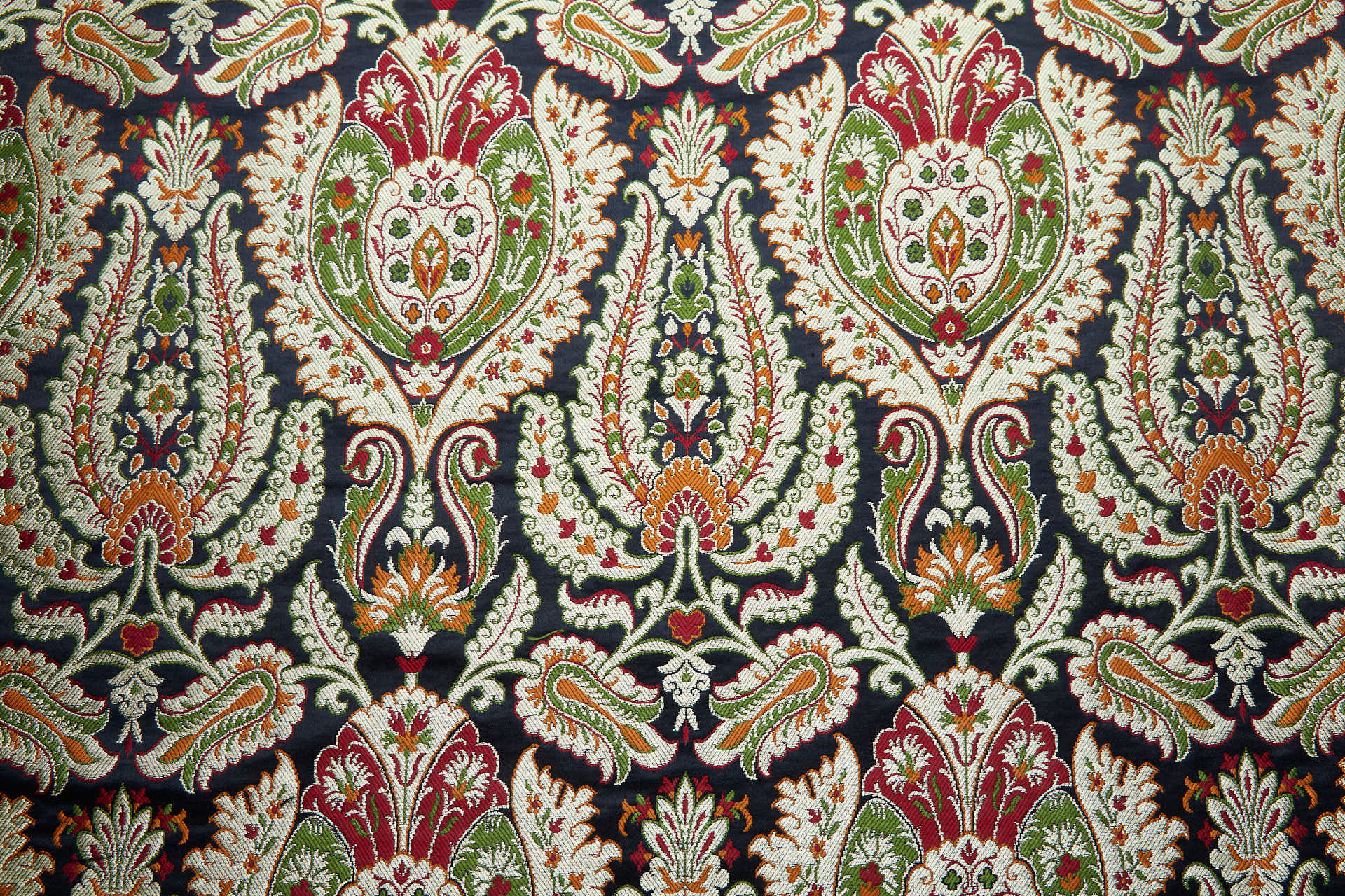 Heavy Banaras Brocade - Black with Red, Orange, Olive and Gold fabric