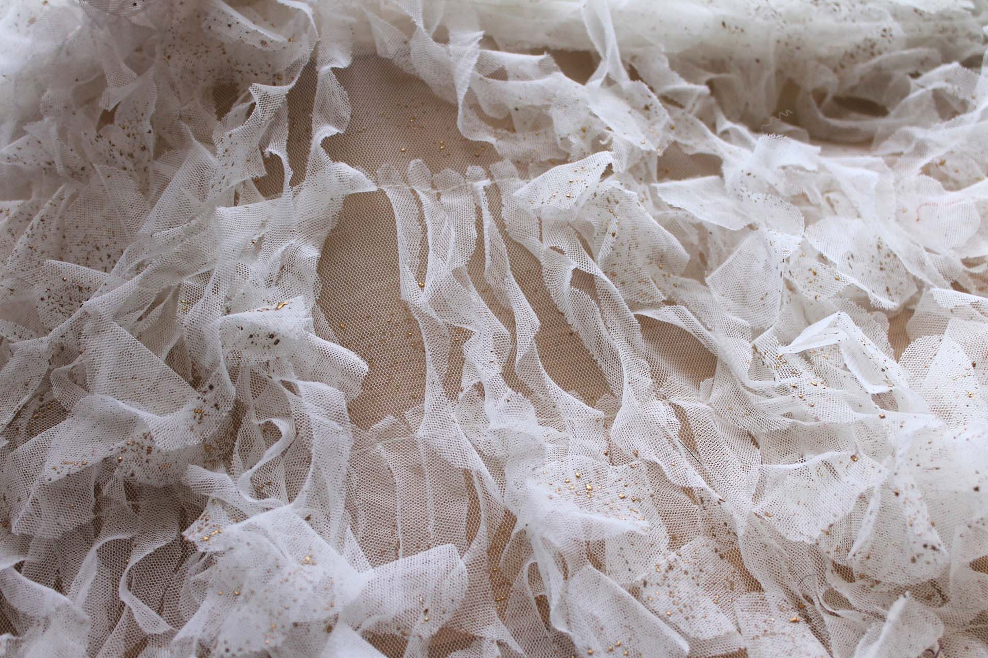 Gold Paint Flecks on Ivory Tulle Curls Applique fabric, image 6 of 7