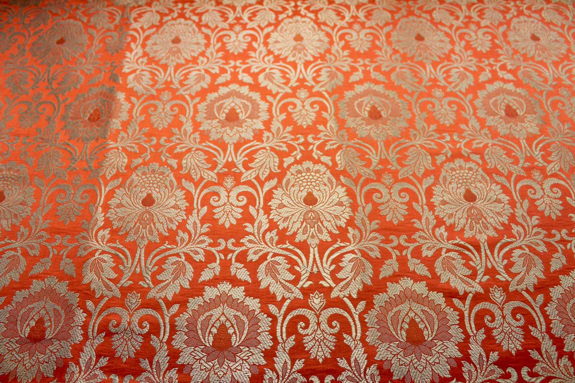 Heavy Banaras Brocade in an Orange and Gold Swirl Pattern fabric, image 2 of 8