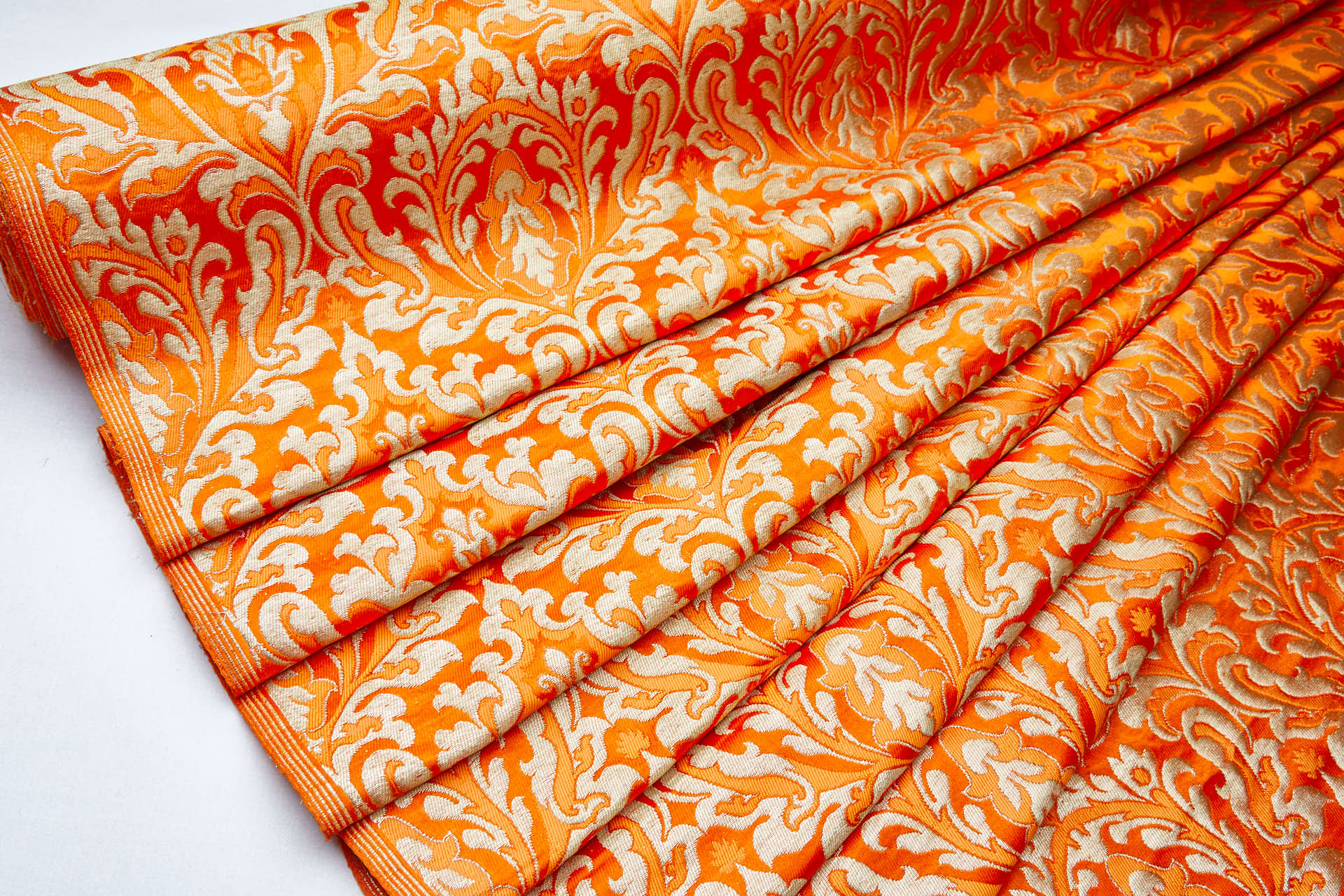 Heavy Banaras Brocade in an Orange and Gold Dense Pattern fabric