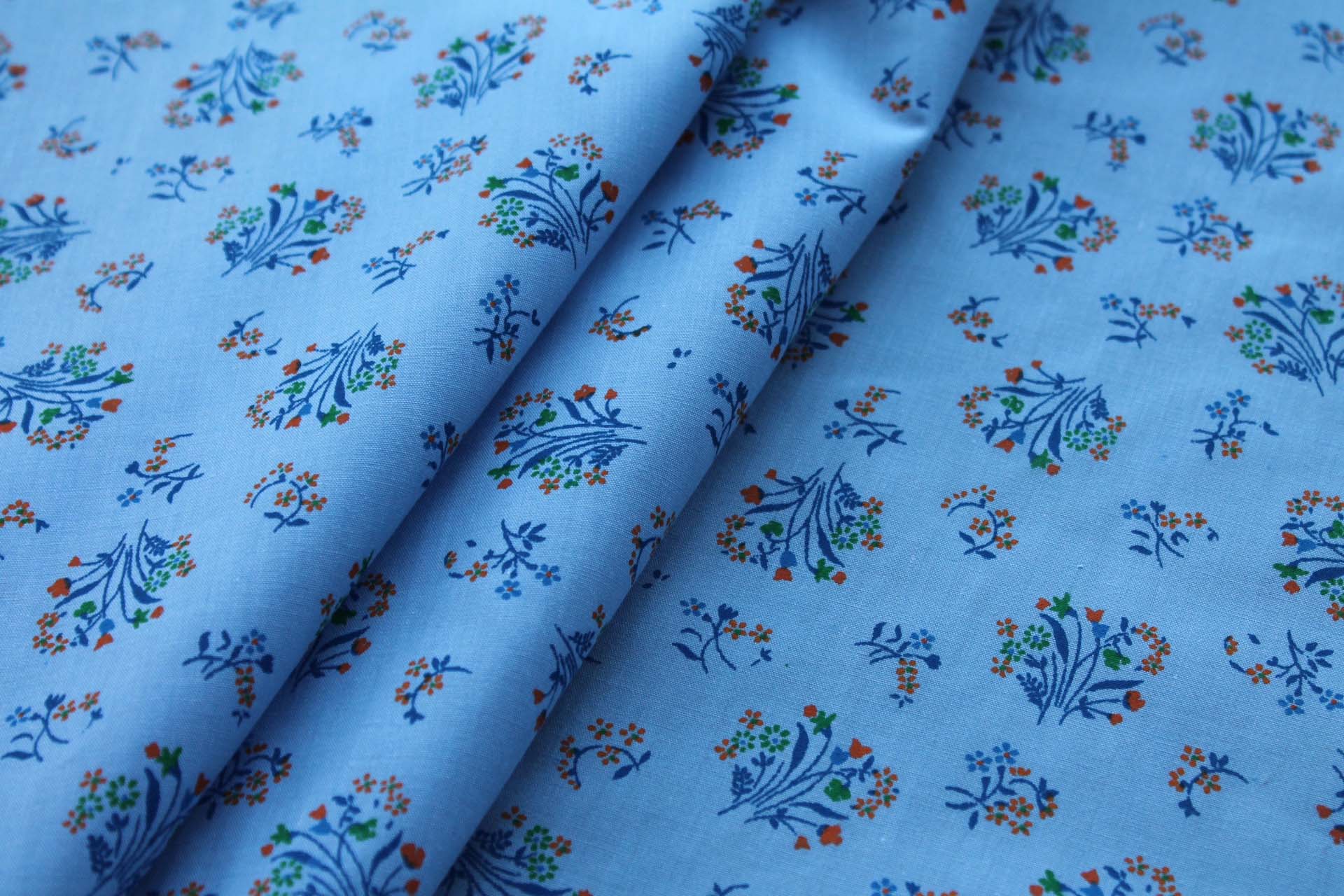 Vintage Printed Cotton - Orange, Blue and Green on Sky Blue fabric