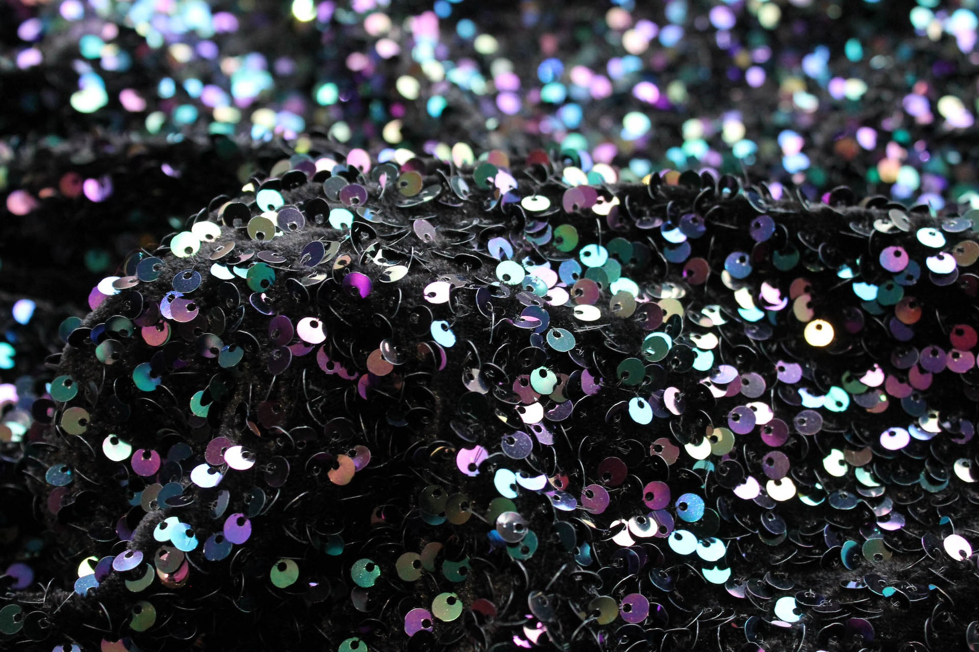 Black Stretch Velour with Iridescent Black Sequins fabric