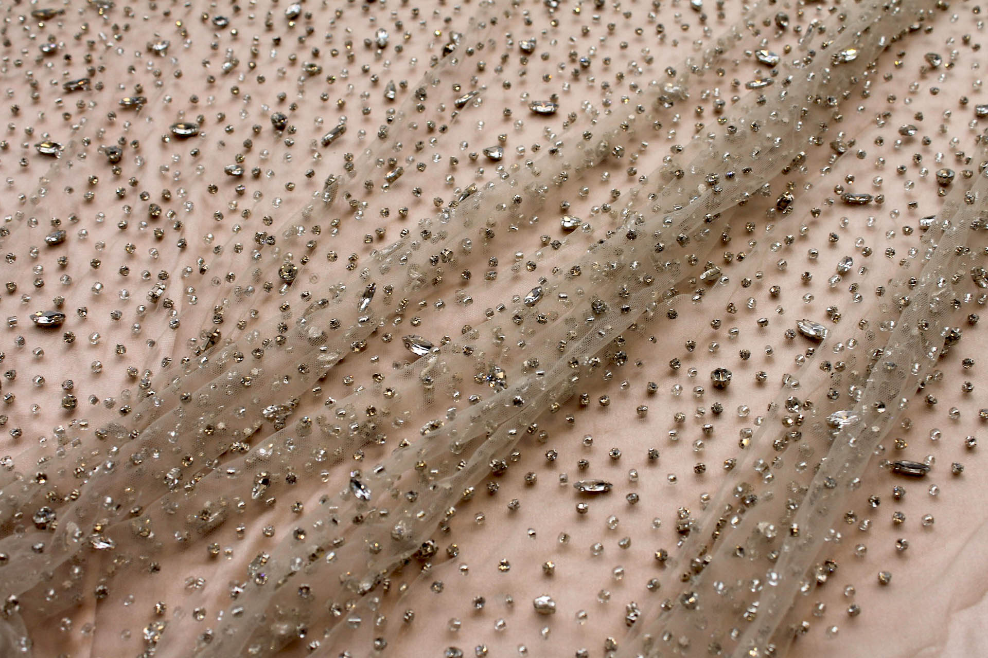 Clear Crystals and Glass Beads on Nude Nylon Tulle fabric