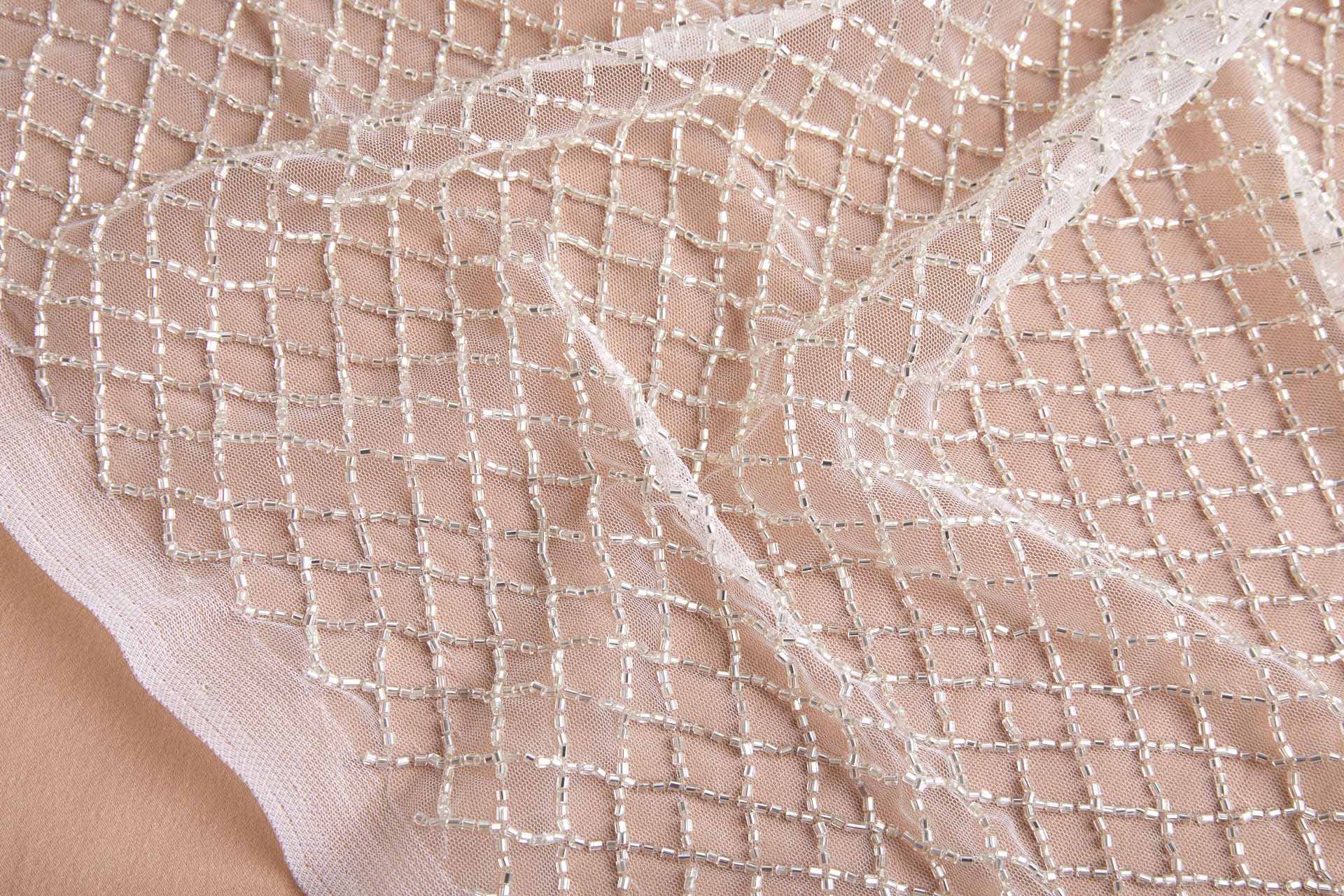 Warm Silver Beaded Fishnet Design on White Tulle fabric