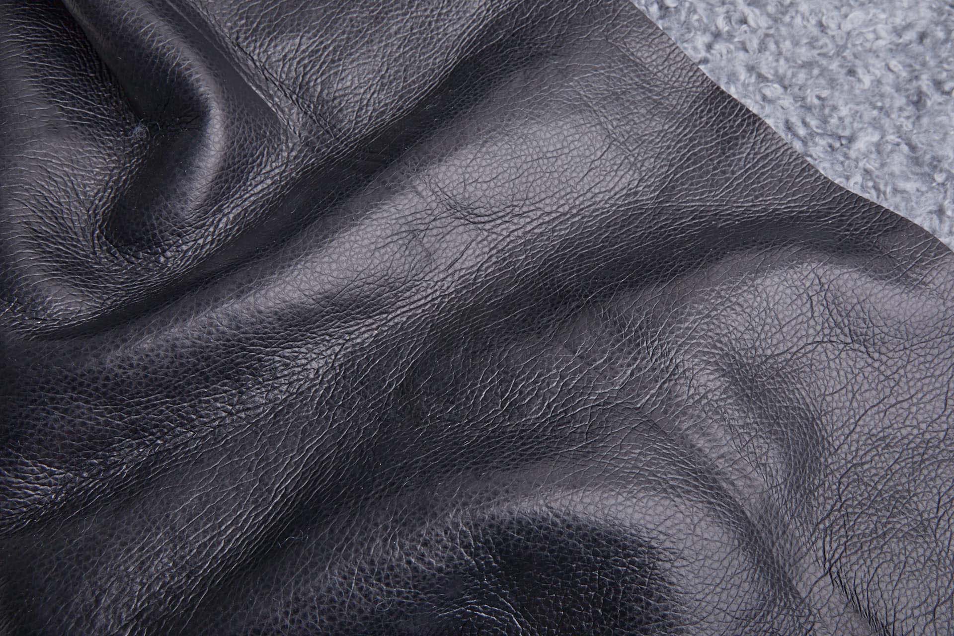 Shearling Faux Fur Backed Leatherette - Steel Grey on Black fabric, image 4 of 6