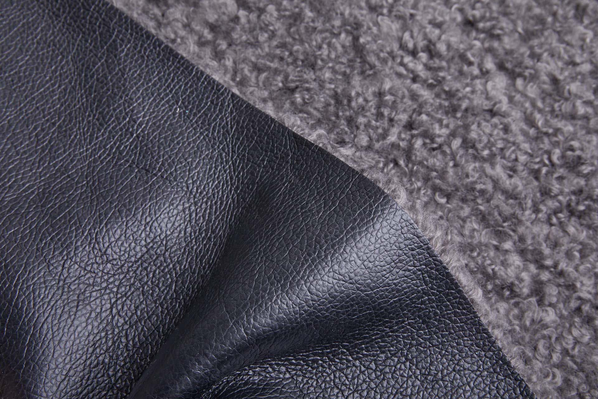 Shearling Faux Fur Backed Leatherette - Gunmetal Grey on Black fabric
