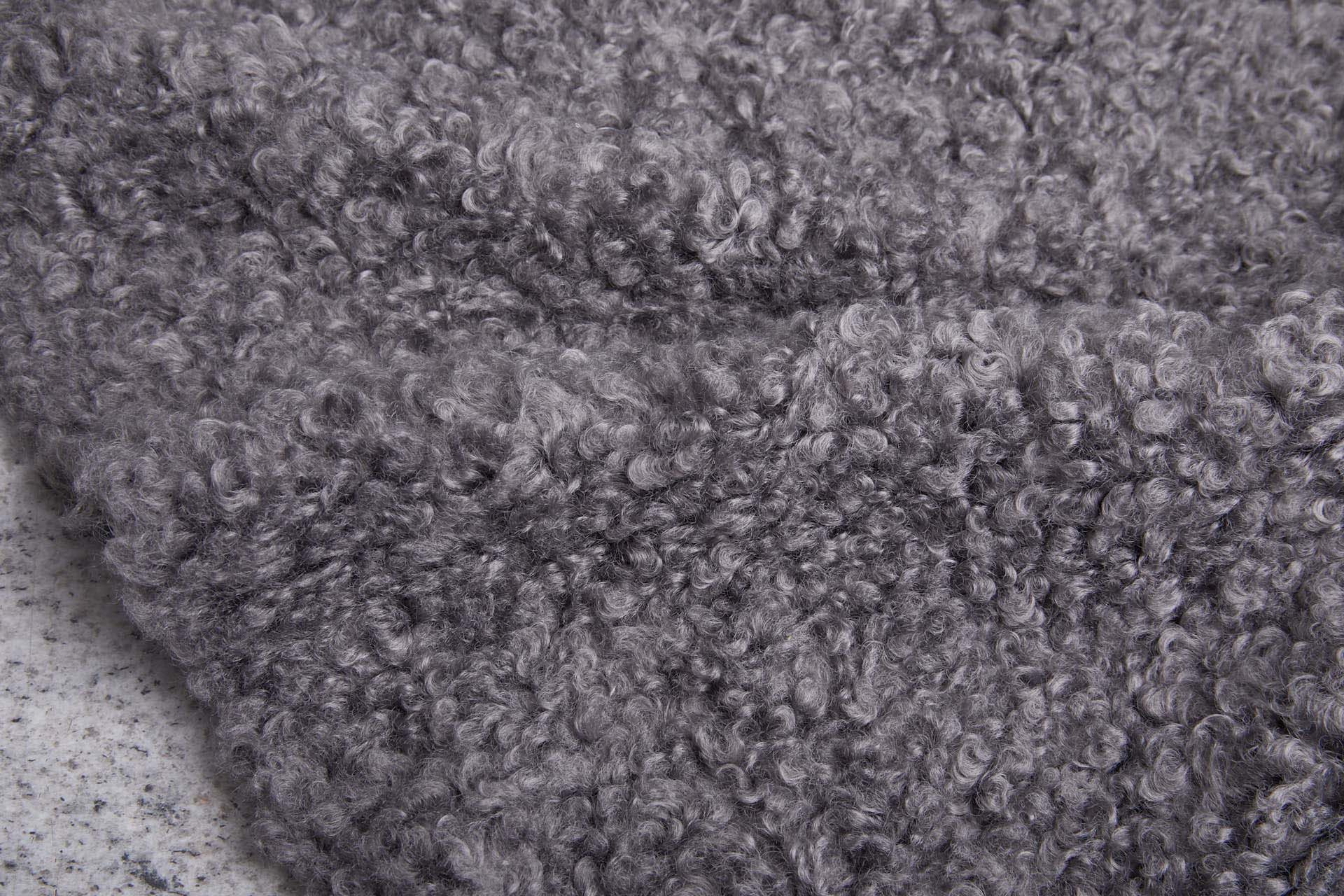 Shearling Faux Fur Backed Leatherette - Gunmetal Grey on Black fabric, image 3 of 7