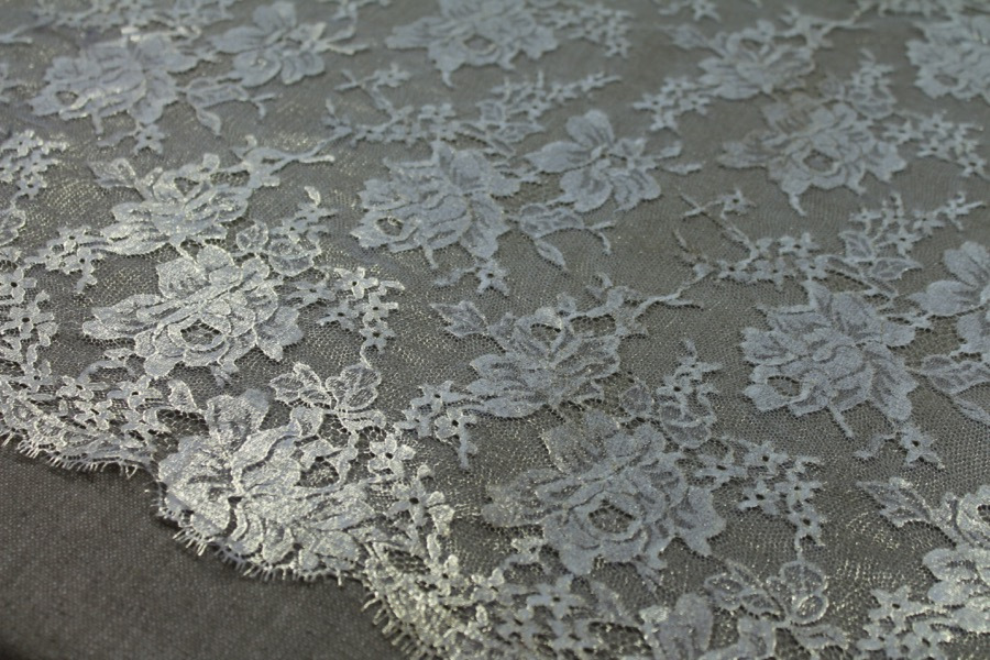White Chantilly lace, gold foiled, rose design. Double scalloped. fabric