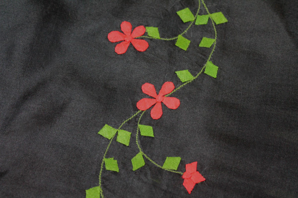 Black Silk Organza - Red and Green Applique Flowers fabric
