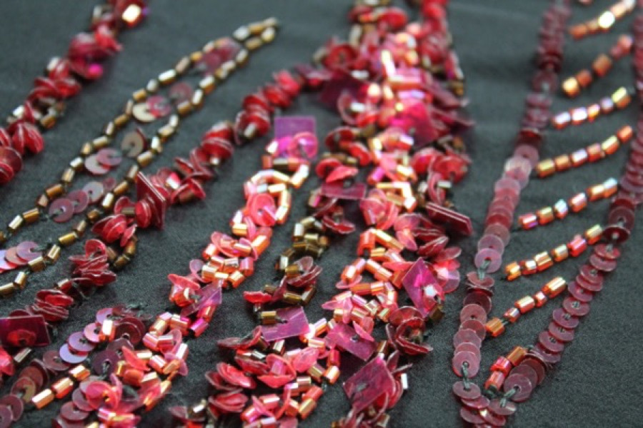 Black Chiffon with Red and Purple Sequinned Pattern fabric