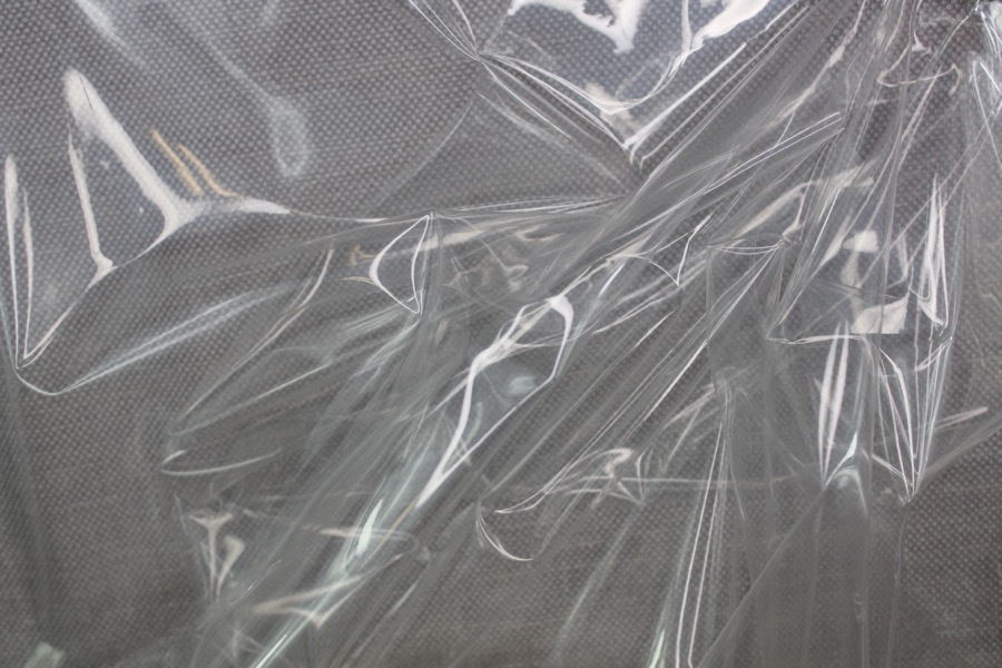 Photographed on a textured grey background for visibility.