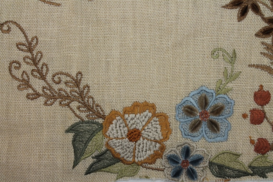 Floral Embroidered Linen in Blue, Orange and Greens on Cream fabric, image 9 of 9