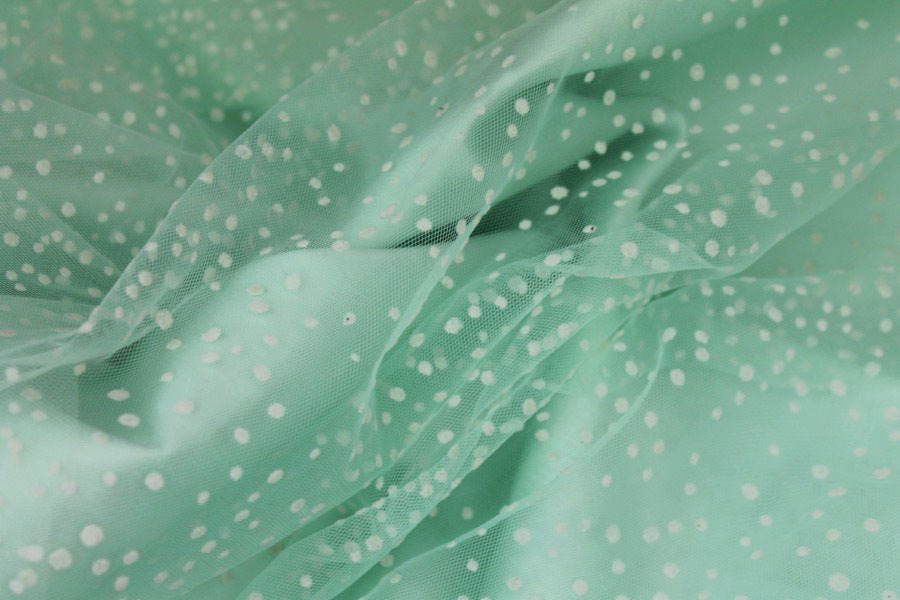 Photographed on a mint coloured background fabric