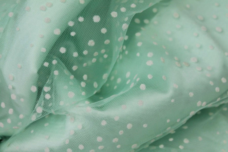 Photographed on a mint coloured background fabric