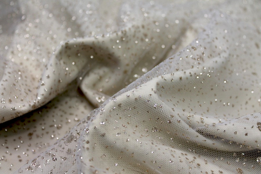 Photographed on a cream fabric