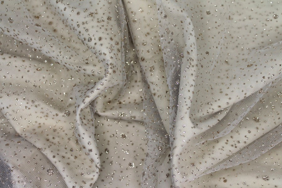 Photographed on a cream fabric