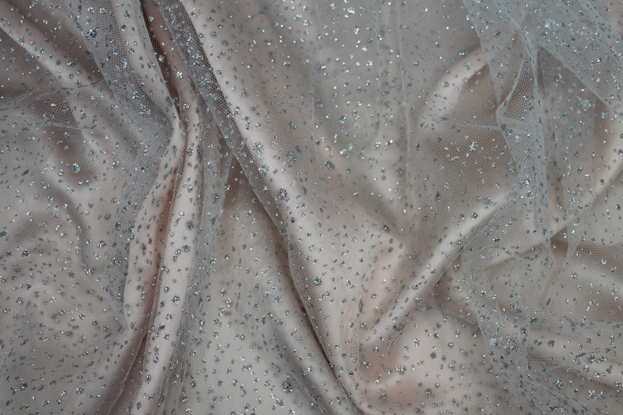 Photographed on a pale pink fabric