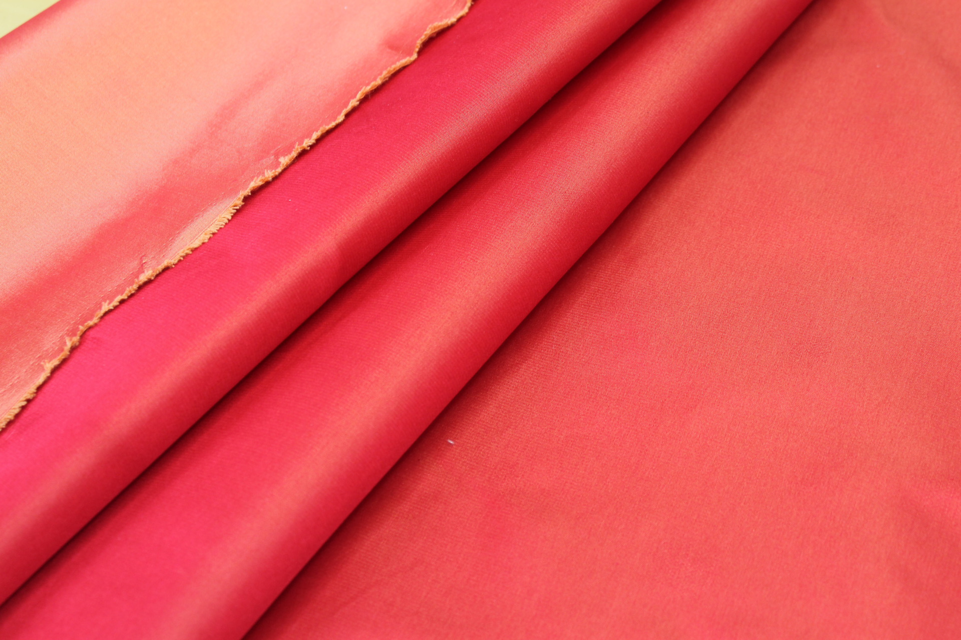 Two Tone Silk Duchesse Satin - Red/Orange fabric, image 4 of 4