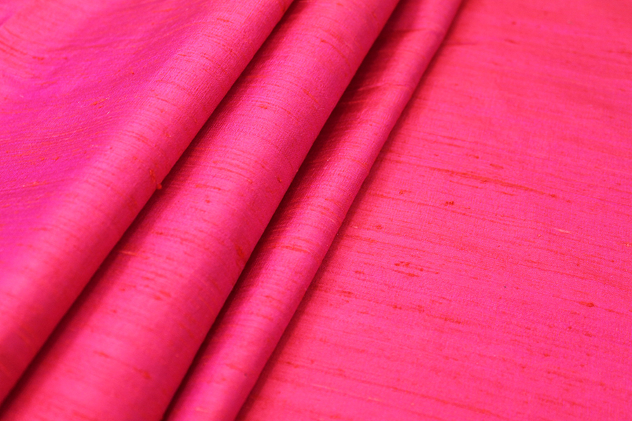 Textured Silk Dupion - Red shot Pink fabric