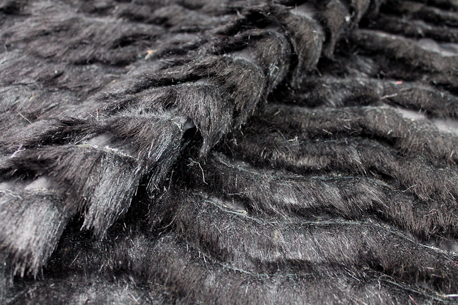 Cut Faux Fur Strips on Habotai - Black on Black fabric