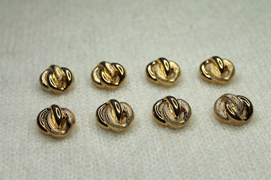 Gold Plastic Decorative "Knot" Button - Oval, image 3 of 3