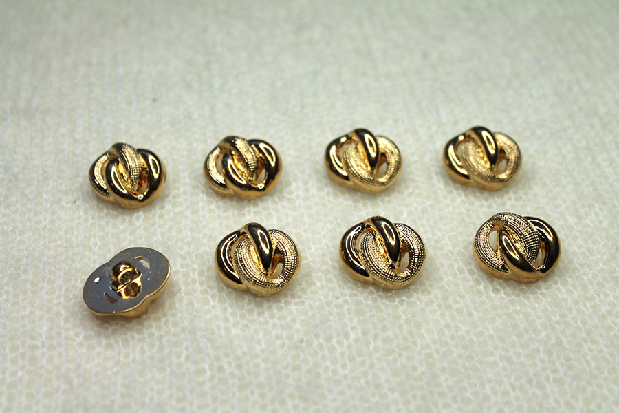 Gold Plastic Decorative "Knot" Button - Oval