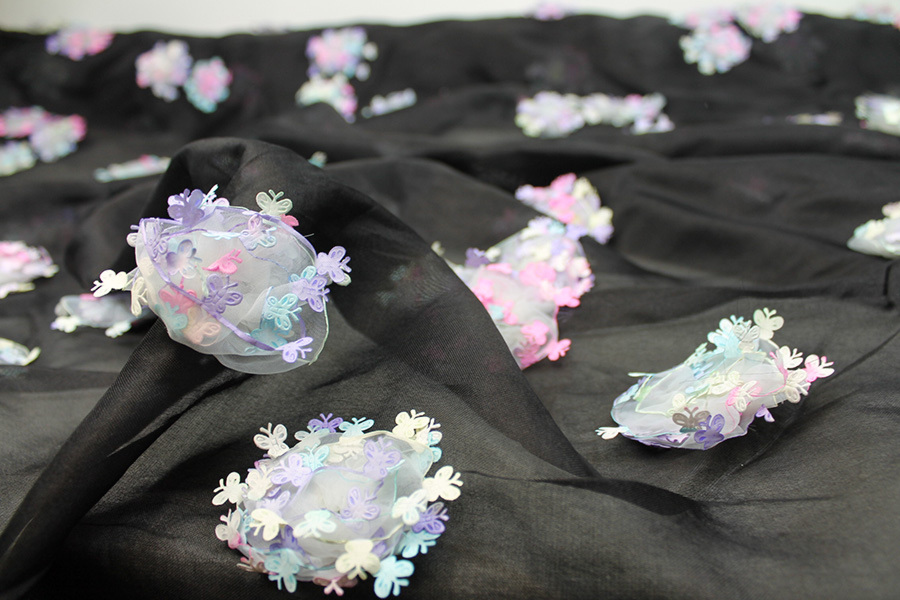 Black Silk Organza with Pastel Butterfly Pom-Poms fabric