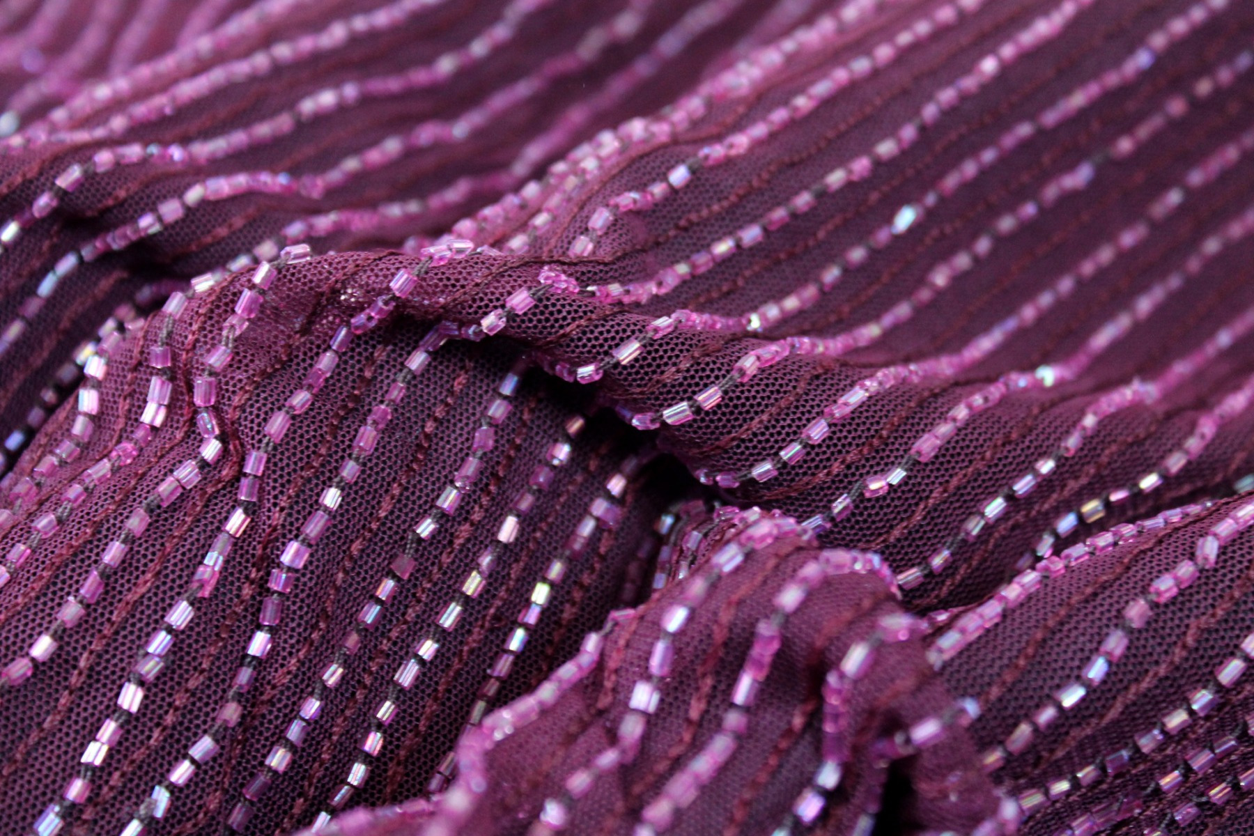Purple tulle with purple embroidery and bugle bead stripes
