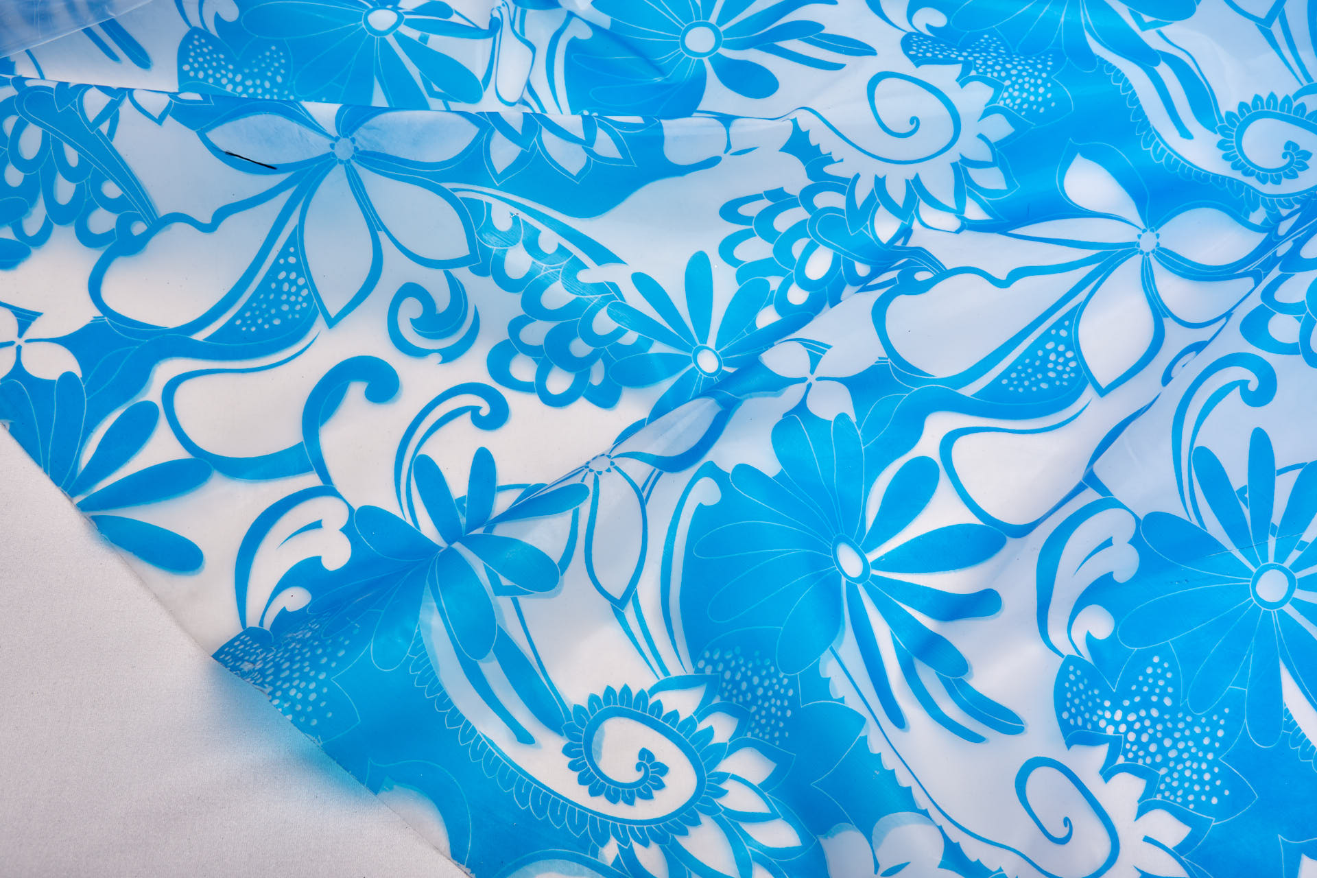 Floral Printed Clear Plastic - Blue fabric