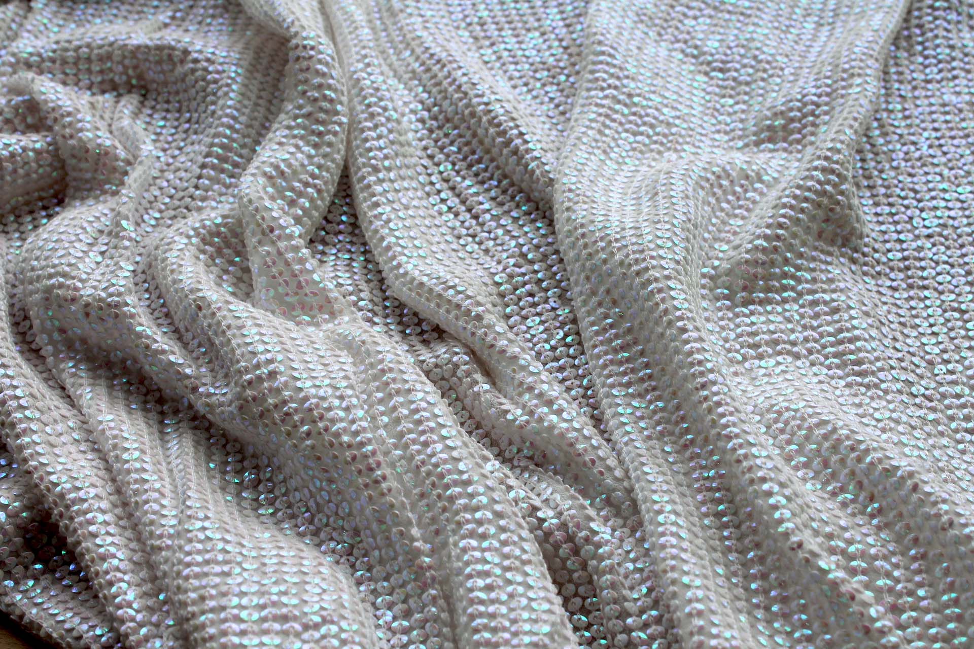 Small Oval Iridescent Ivory Sequin On Silk Chiffon fabric, image 8 of 8