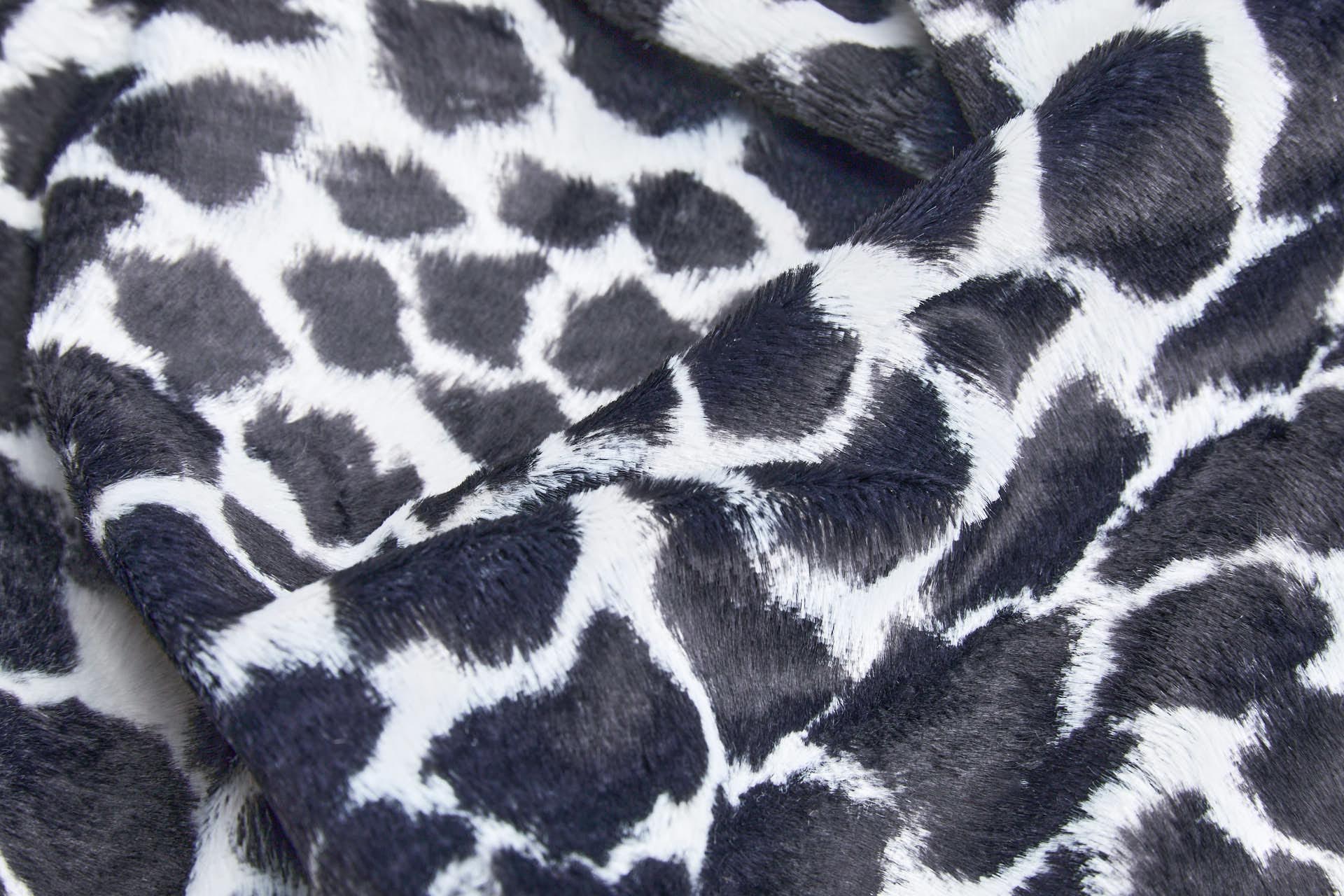 Pony Skin in Black and Ivory Giraffe Spots fabric