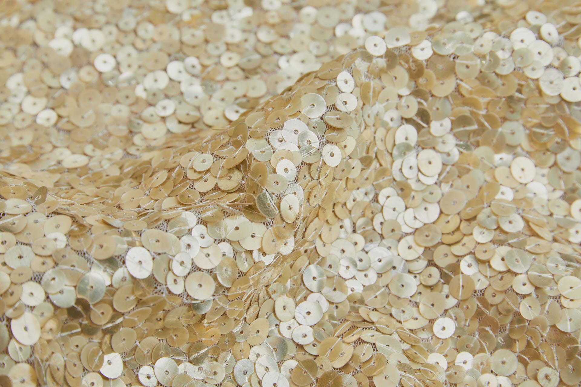 Gold Iridescent Mixed Sequins on Ivory Tulle fabric