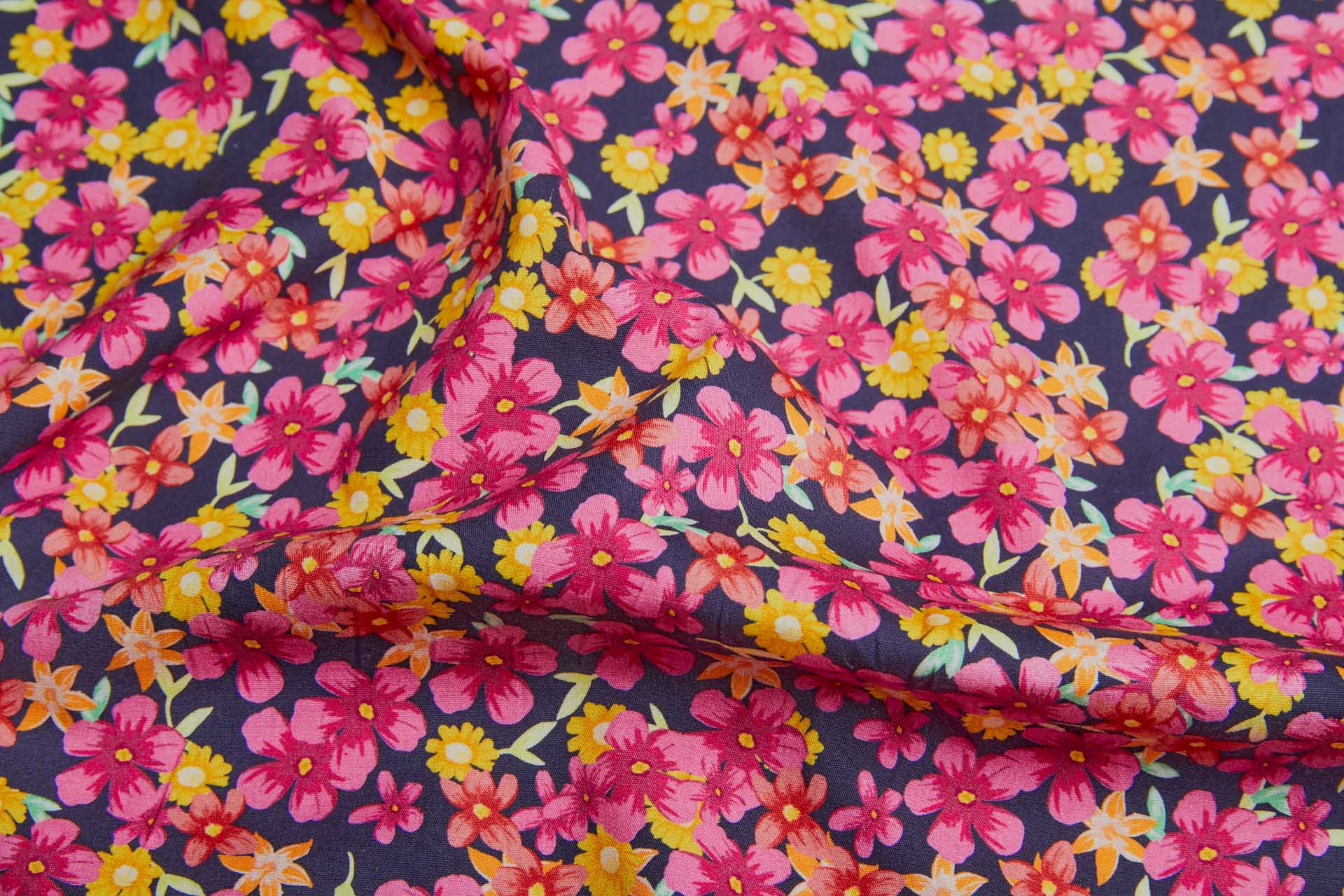 Floral Print Stretch Cotton - Pinks, Orange and Greens on Inky Blue fabric