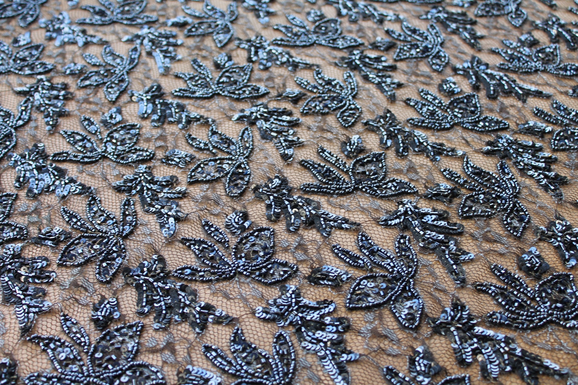 Beaded and Sequinned Lace in Anthracite on Olive fabric