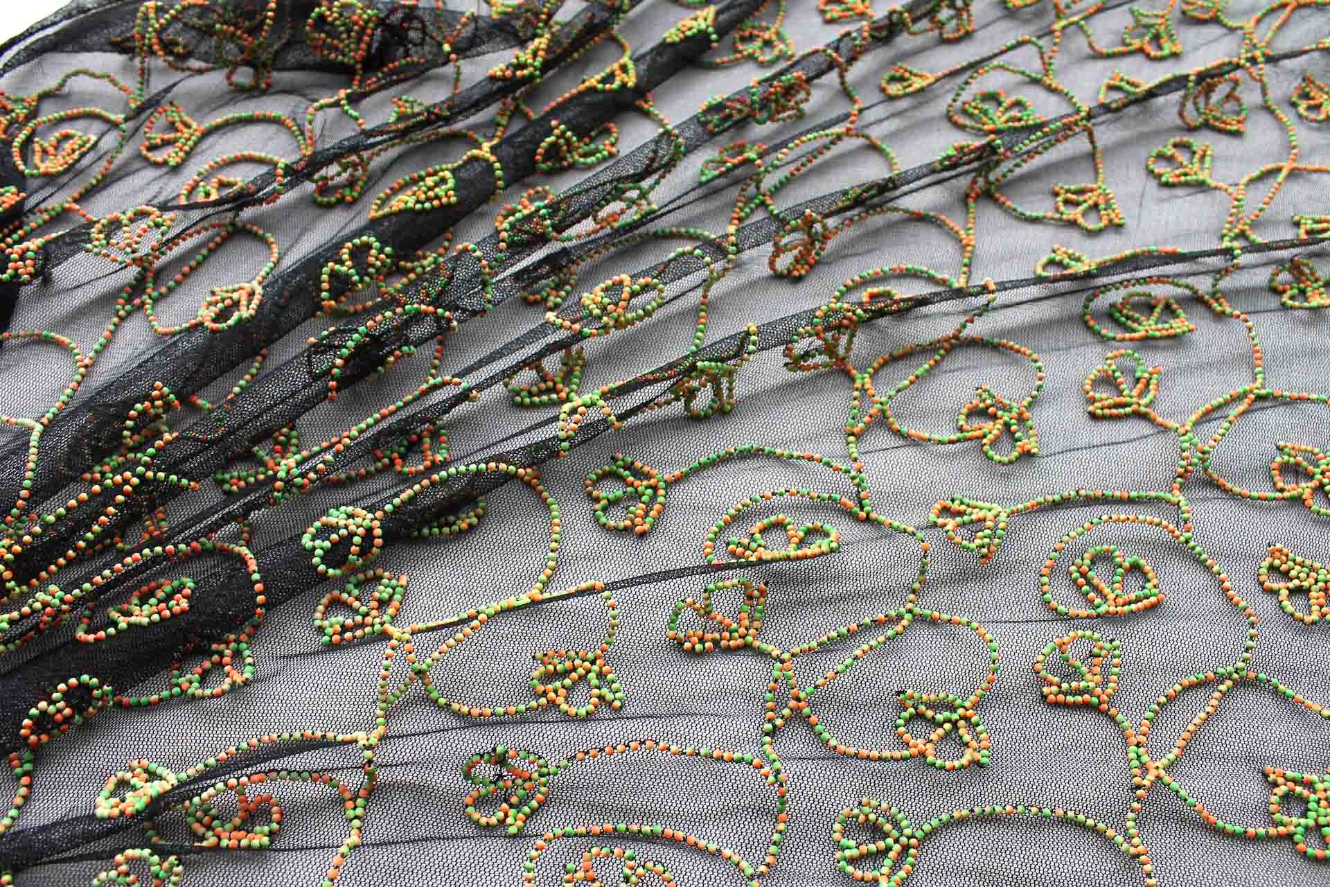 Black Tulle Beading with Double Tone Green and Orange Beads fabric