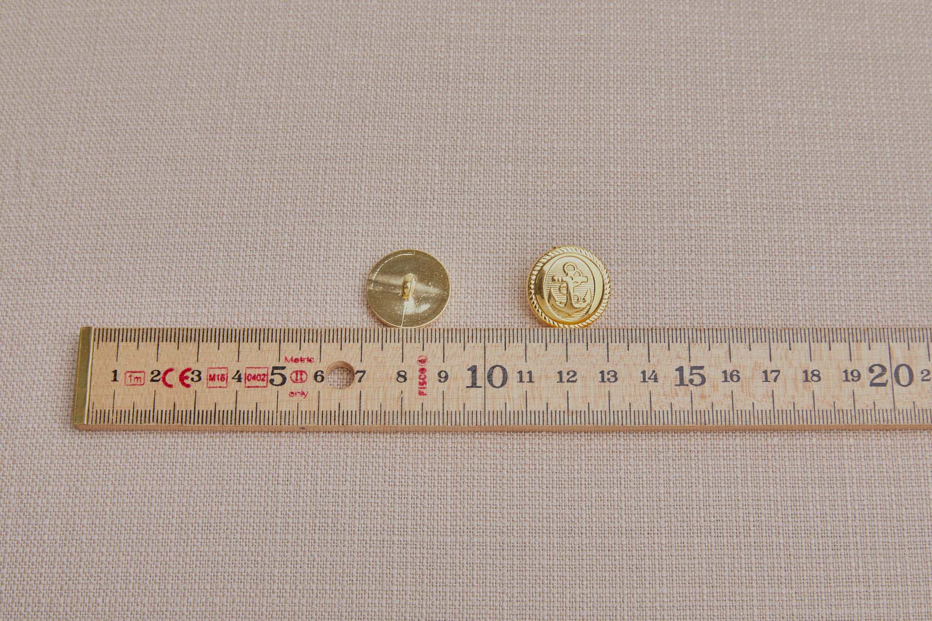 Reproduction Bright Gold Plastic Uniform Button, image 2 of 3