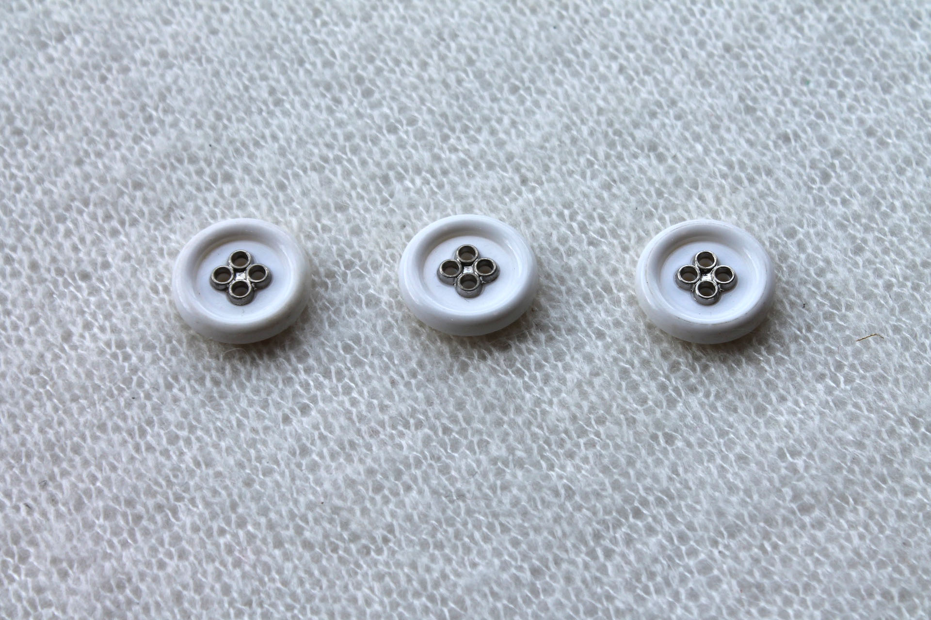 Round White Nylon Button with Metal Eyelets - 2.5cm, image 2 of 4