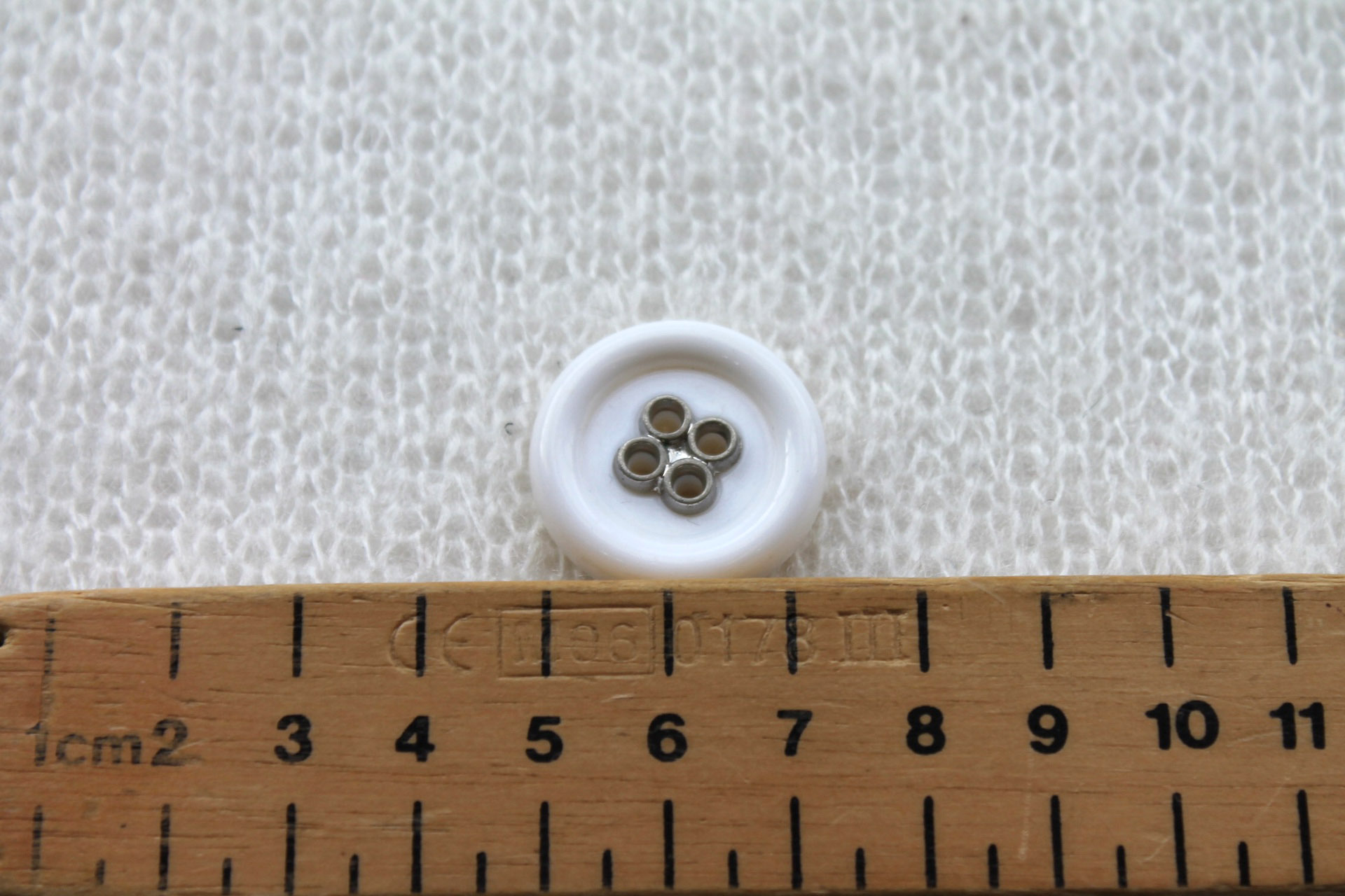 Round White Nylon Button with Metal Eyelets - 2.5cm, image 4 of 4
