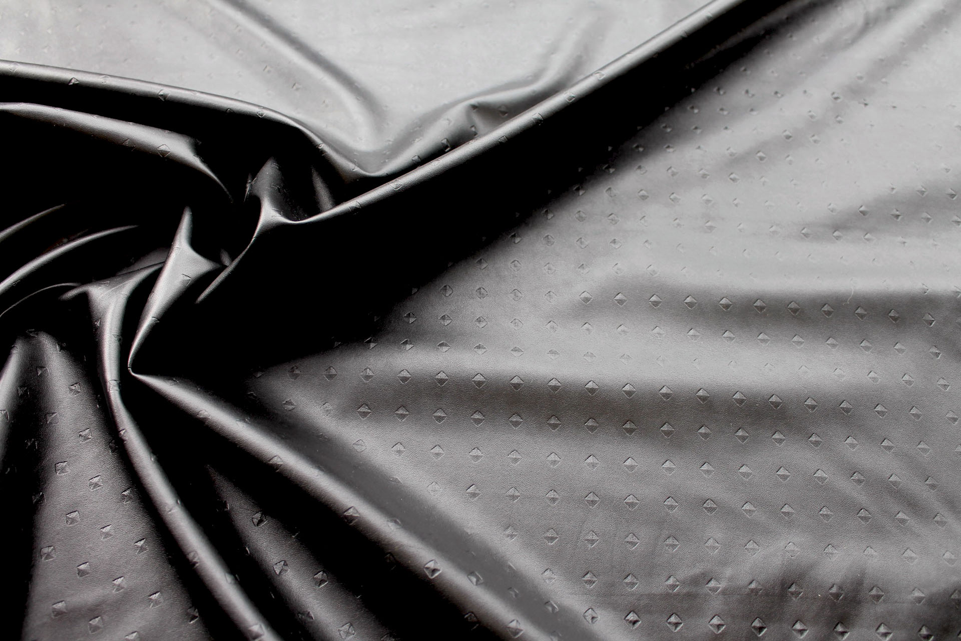 Embossed Soft Leatherette - Black Nail Head fabric