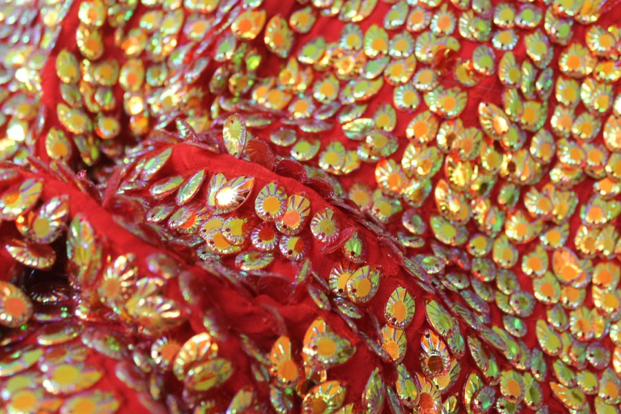 Dragon Scale Sequin in Iridescent Red On Silk Chiffon fabric