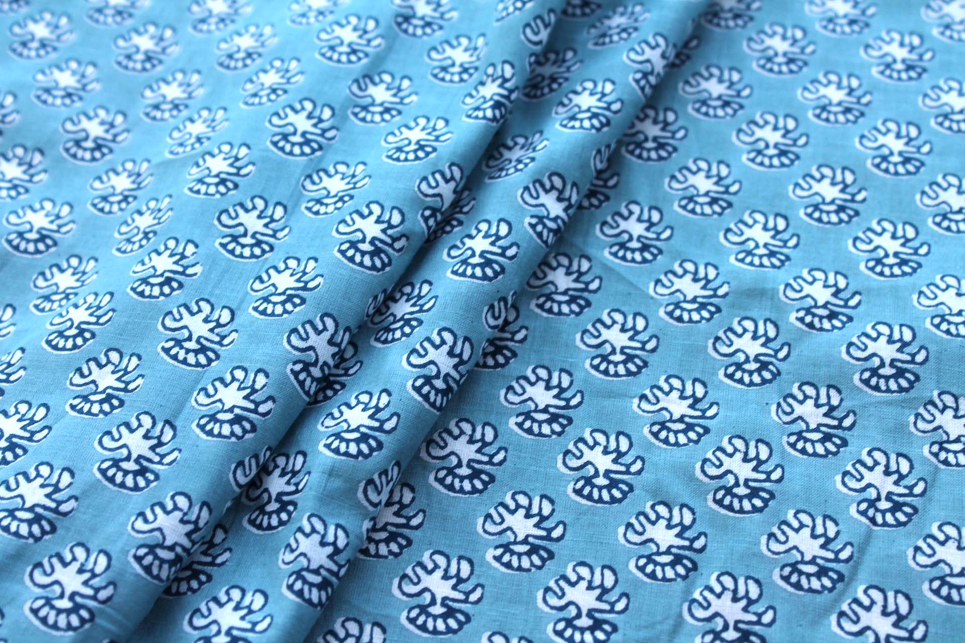 Printed Cotton Lawn - Off White and Dark Blue on Pale Blue fabric