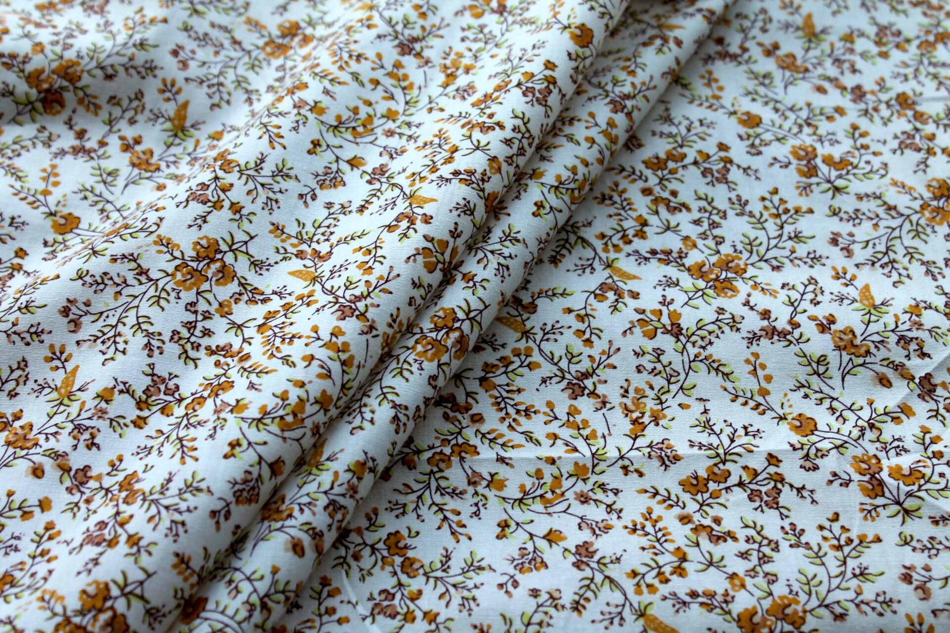 Printed Cotton Lawn - Orange, Tan and Green on Off White fabric
