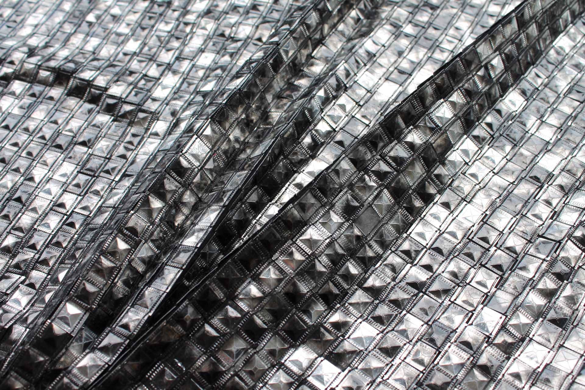 Tarnished Stud Sequin on Silk Chiffon - Gunmetal fabric