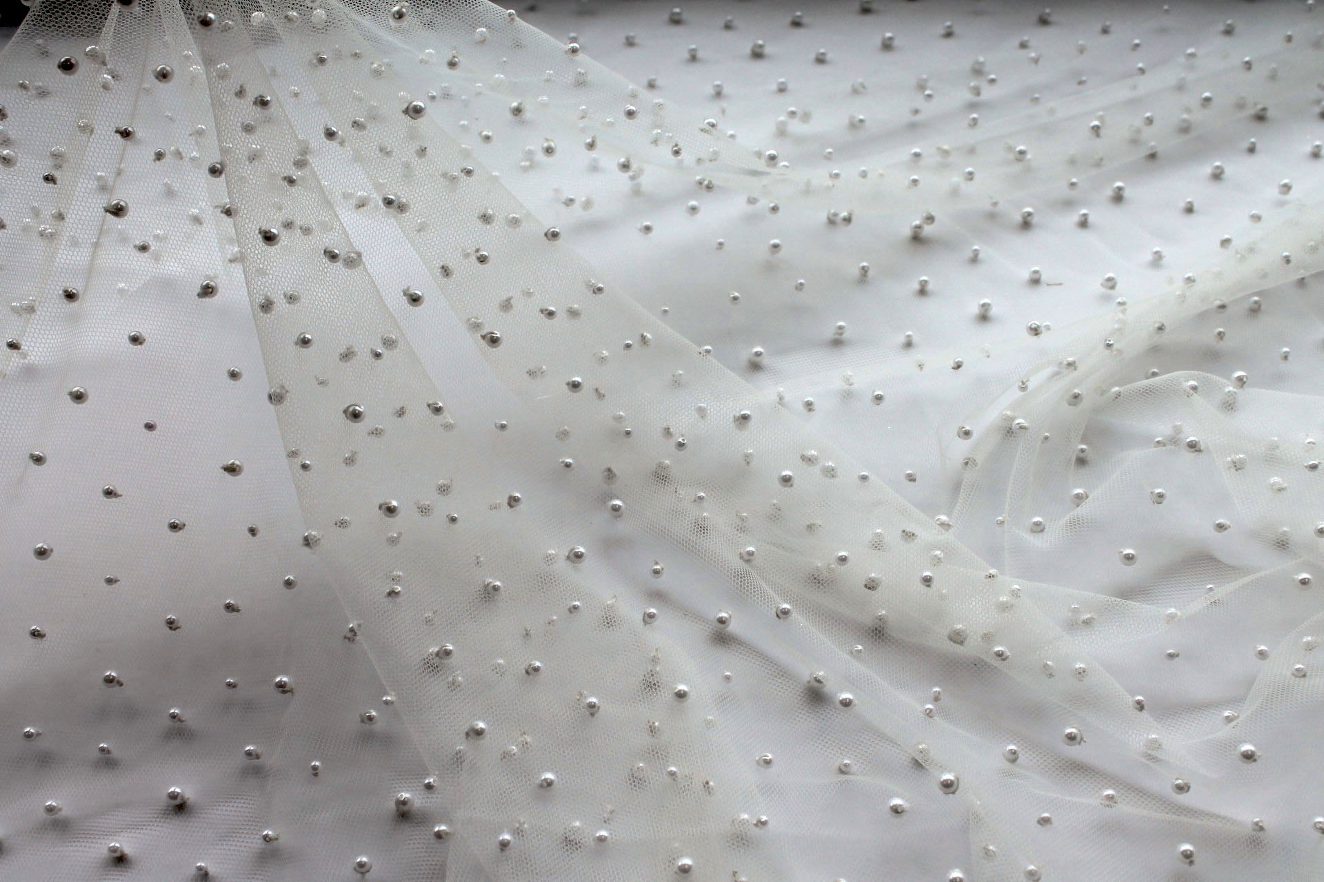 Small Ivory Pearls on Ivory Nylon Tulle fabric