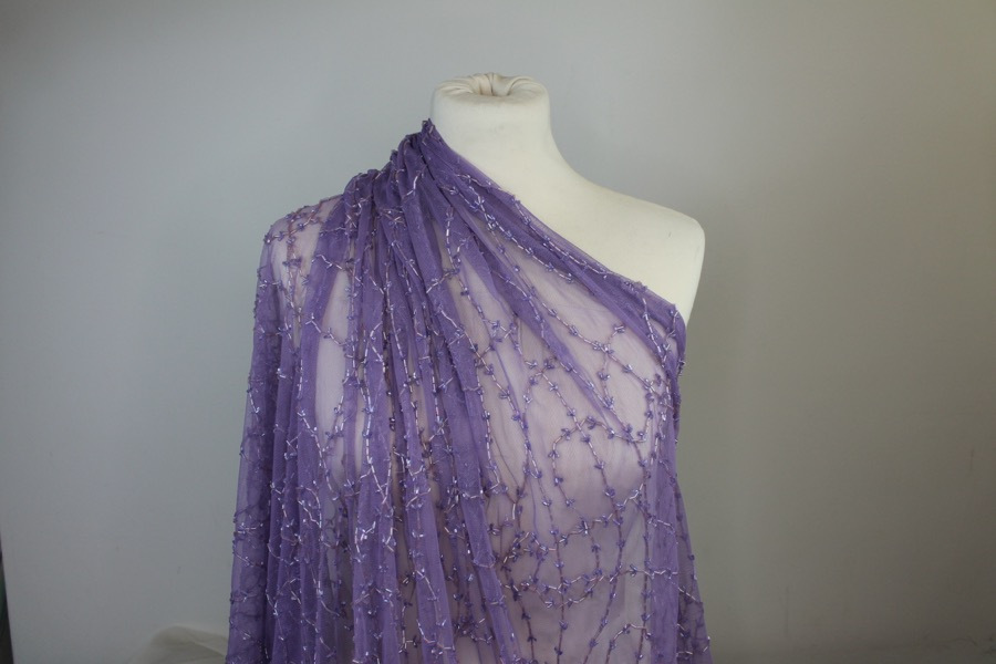 Lilac tulle with clear lilac bugle beads in a barbed wire/leaf pattern fabric, image 9 of 9