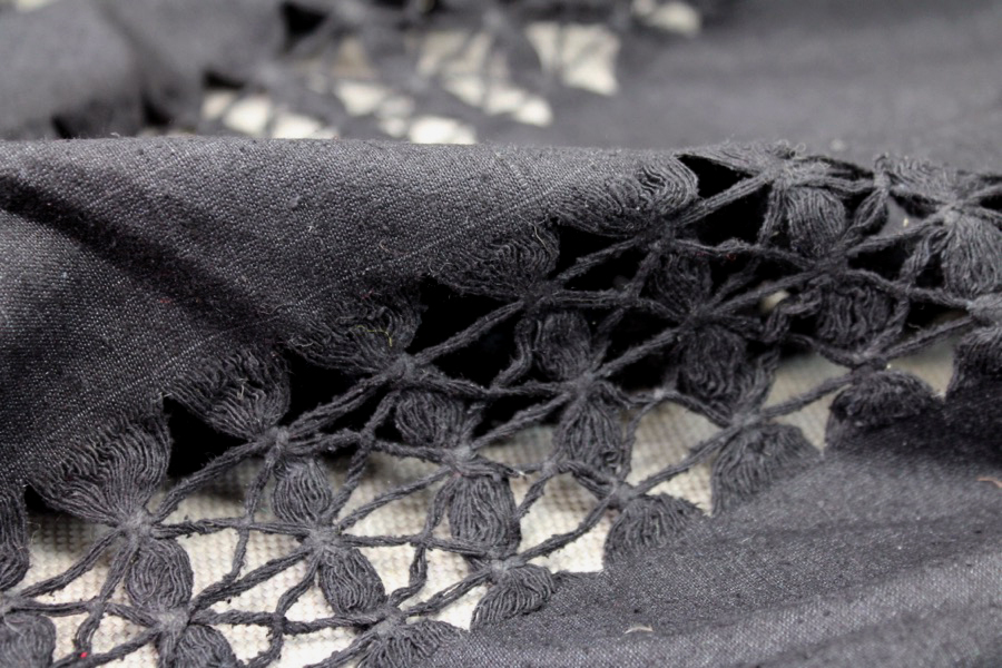 Black Silk Noil with String Pulled and Tied Lines fabric